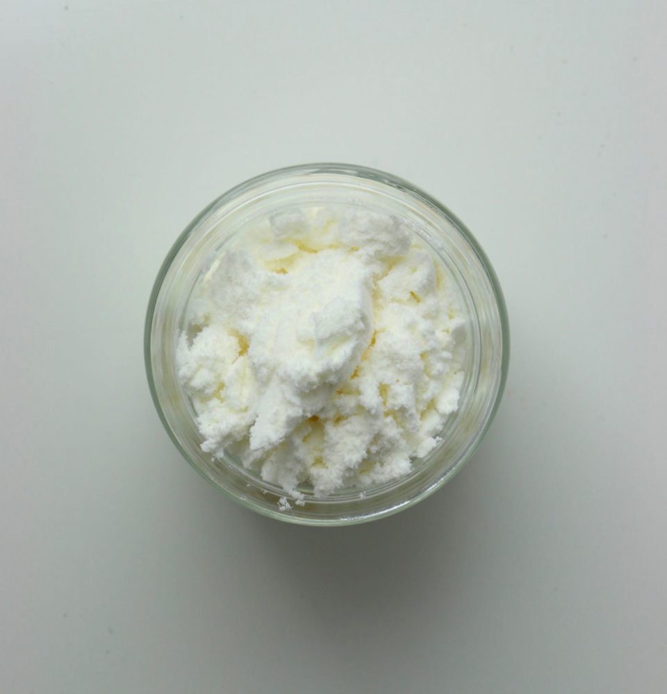 A clear glass bowl filled with sweet whey powder used in baked goods, confectionery products and more.